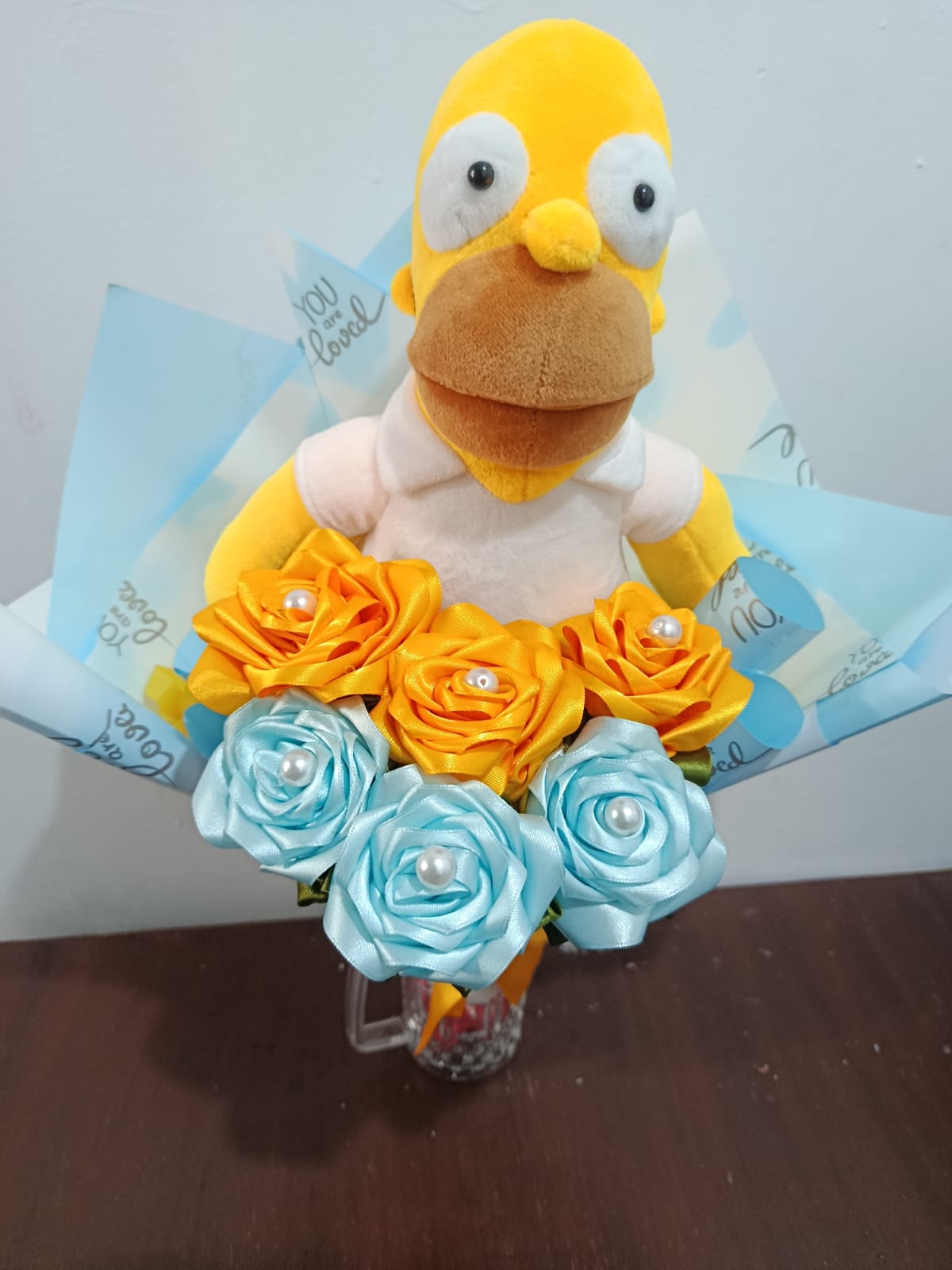 Ramo con seis rosas más peluche 