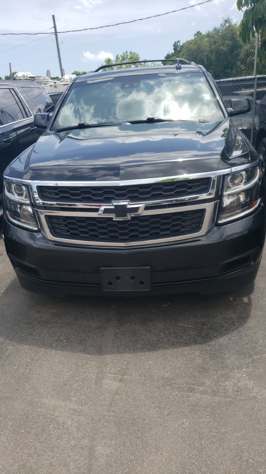 80.) 2017 CHEVROLET Tahoe Black,  128, 788 Millas. VIN: 394703