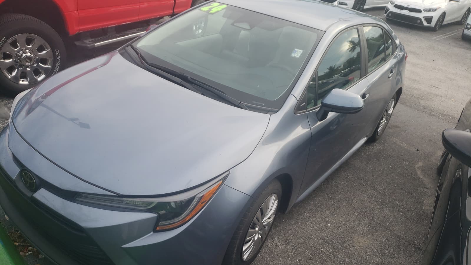 99.) 2024 TOYOTA COROLLA Grey, 14,000 Miles. VIN: 118036